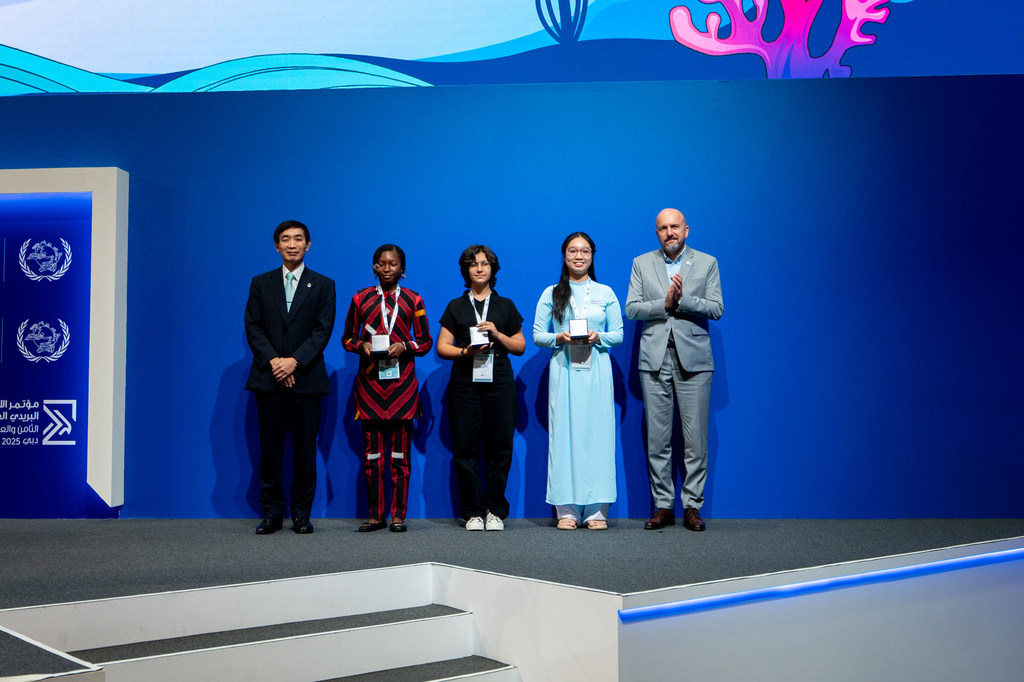 Fifteen-year-old Reyyan Demiriz from Türkiye (centre), has taken first prize in the 54th International Letter-Writing Competition for Young People, organised by the Universal Postal Union.